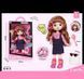 Кукла A 923 B (24/2) высота: 30 см, шарнирные суставы, имитация стеклянных глаз, аксессуары, расческа, в коробке