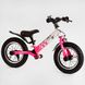 Велобіг Corso "Skip Jack" 25025 Рожево-білий, надувні колеса 12", сталева рама з амортизатором, ручне гальмо, підніжка, в коробці